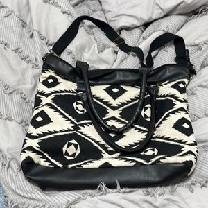 Target Mossimo Bag.  Small scuff on the bottom of the bag.  Great condition